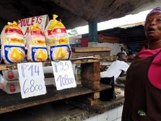 Vendeuse de poulet à Kinshasa