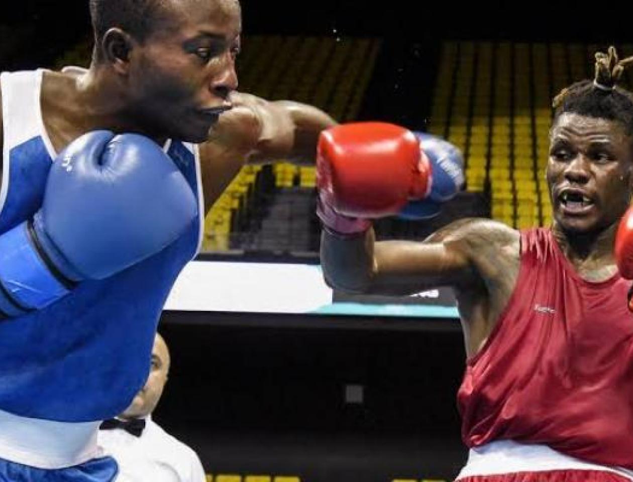 Le boxeur congolais, David Tshama (en bleu sur la photo). 